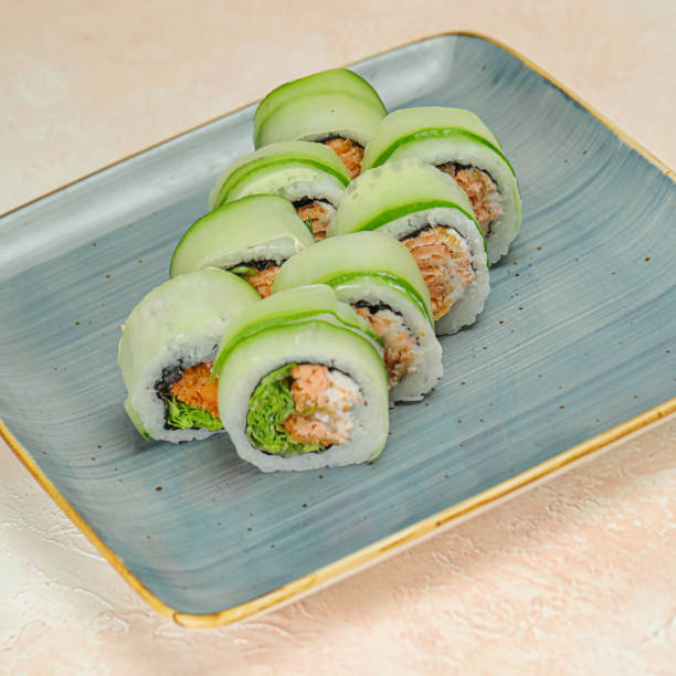 Blue Plate With Sushi Covered in Cucumber