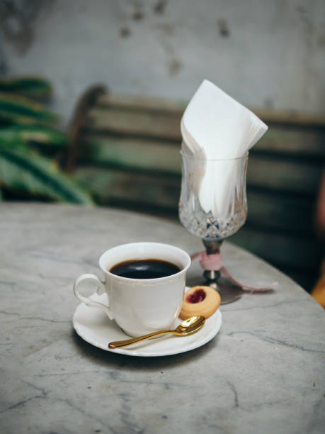 istock Black coffee in a white cup with oatmeal cookies for breakfast. Beautiful lifestyles. 2000495462