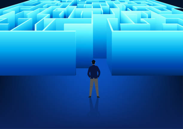 istock Businessman standing in front of the maze Shows the problems faced by businesses that must find solutions in order for the business to grow and survive. Willingness to overcome obstacles 2000496012