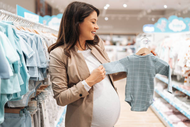 istock Young couple in baby shop 2000522939