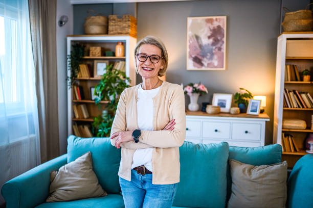 istock Smiling mature woman at home 2000555647