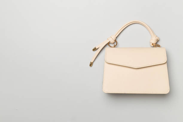 istock Fashionable leather bag on color background, top view 2000569703