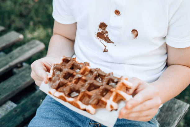 istock Stains of dirty chocolate on clothes. 2000590734