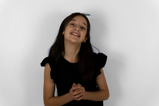 Portrait of a girl on a white background.