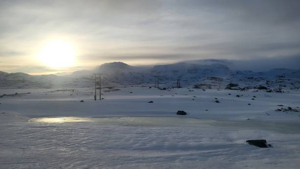 istock sunrise over snowcapped mountains long Bergen Railway 2000665789