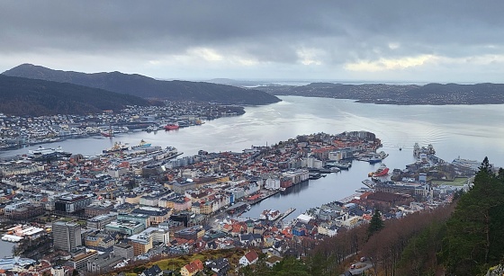 Dec 2023 - Bergen, Norway - Mount Fløyen is a popular tourist attraction located in Bergen, Norway. It is known for its panoramic views of the city and surrounding fjords. The mountain is easily accessible by a funicular railway, which takes visitors to the summit in just a few minutes. At the top, there are several hiking trails, a restaurant, and a souvenir shop. Mount Fløyen is also home to a large population of goats, which can often be seen grazing in the area.