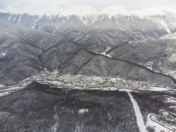 istock View of the winter sunset and snow-covered mountains in Sochi 2000680135