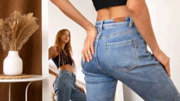 istock A young beauty shows off in front of a mirror 2000686946