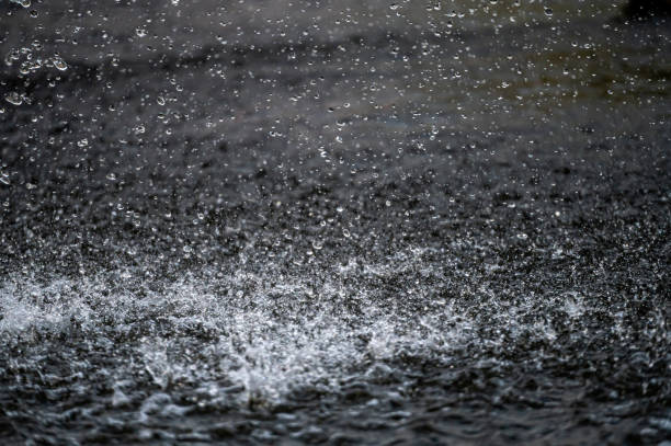 istock water splash with small drops in the fountain, abstract natural, selective focus background 2000711027