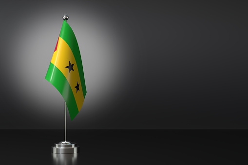Small National Flag of Democratic Republic of SÃ£o TomÃ© and PrÃ­ncipe on a Black Background. 3d Rendering