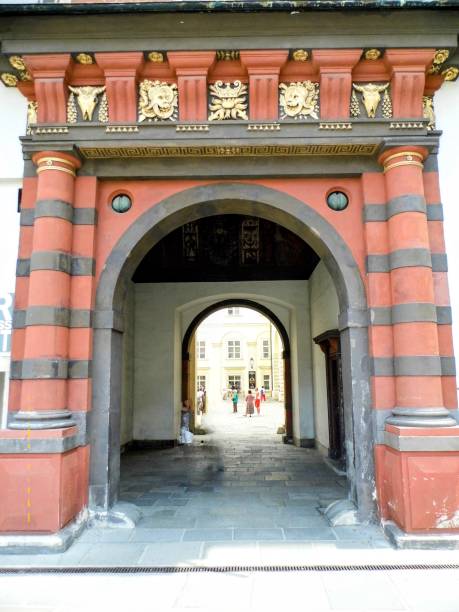 istock Vienna old town gate historical building ancient columns balcony architecture downtown main street square tower arch Austria 2000789495