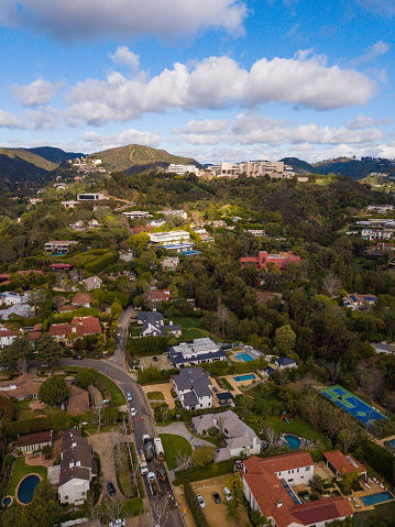 Panoramic views of the affluent Brentwood neighborhood, with mansions in the foothills of the santa monica mountains, with the Getty Center in the background. Picture taken in Los Angeles, California, with a drone, on February 2, 2024.