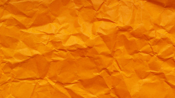 istock Orange Crumpled Paper Texture, Abstract Backdrop from Crumpled Orange Paper 2000805462