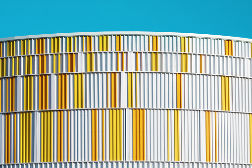 Close up of blue and yellow building.
