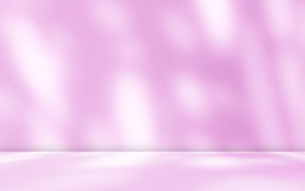 istock Empty purple studio room for product presentation with shadow of tree leaves on the wall. 2000881234