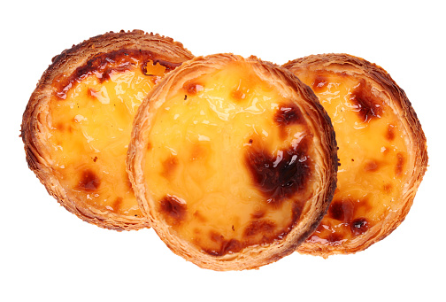Traditional Portuguese custard pie, called pastel de nata, isolated on white