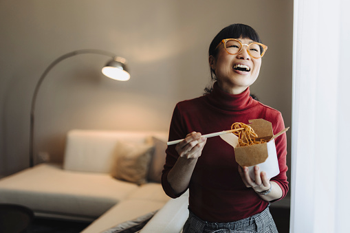 Japanese  eating pasta with chopstick