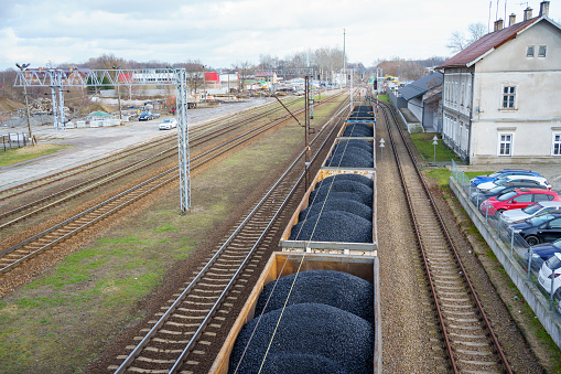 Łańcut, Subcarpathian, Poland - 02 January 2024: Hard coal cars on the siding of the railroad station