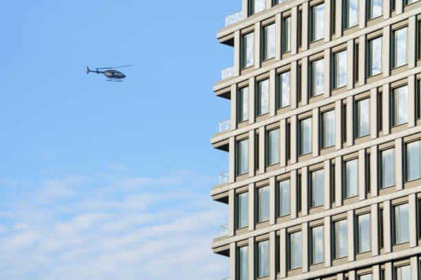 a helicopter passing by the OLYMPIA DUMBO
