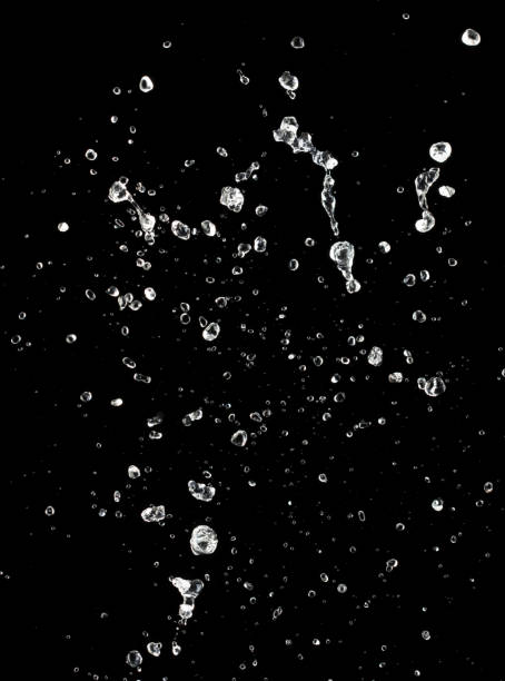istock Shape form throw of Water splashes into drop water attack fluttering in air and stop motion freeze shot. Splash Water for explosion texture graphic resource elements, black background isolated 2001191441