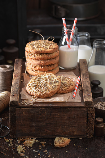 Delicious sunflower seed cookies freshly baked in kitchen. Shortbread cookies best taste with milk.