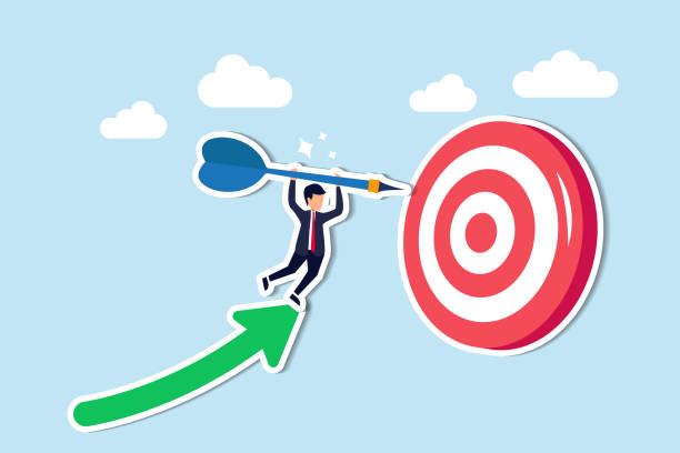 istock Successful business goal attainment is crucial for target achievement concept, businessman leader holding dart running from rising graph arrow and jump to bullseye target to win in business strategy 2001200352