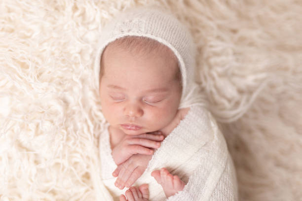 istock Newborn baby girl sleeping 2001209664
