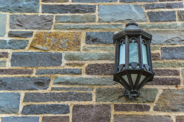 Princeton, NJ, USA - November 12, 2019:  antique lantern and elements of architecture on the educational building. Princeton University, Princeton, New Jersey USA