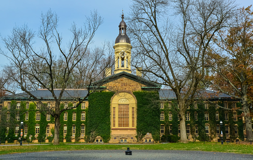 Princeton, NJ, USA - November 12, 2019: Old Nassau Hall, the oldest building with ivy leave covered walls at Princeton University in Princeton, Mercer County, New Jersey US