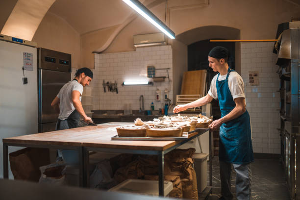 istock Caucasian Bakers Working In A Small Bakery 2001294891