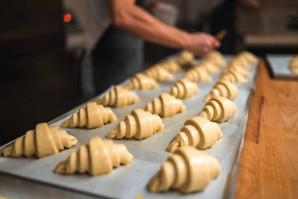 istock Croissants Proofing On A Baking Trays 2001294897