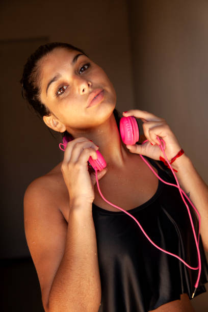 Woman having fun listening music with headphones