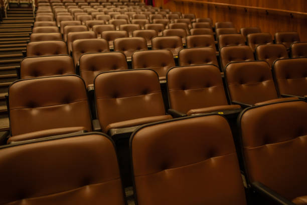 istock Theater or cinema auditorium with empty padded seats 2001455280