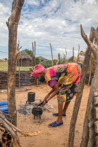 istock village woman cooking 2001475062