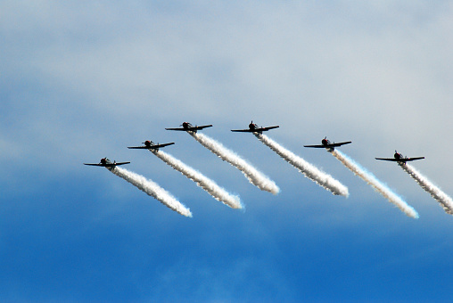 Wantagh, NY, USA May 23 A team of skywriters leave a vapor trail as they fly through the sky over Wantagh, New York