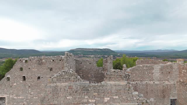 Ancient Ruins of Chateau de Montlaur - aerial ascend