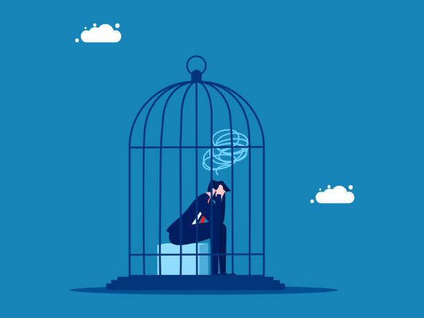 istock concept of suffering. Businessman sitting sadly in a cage 2001598134