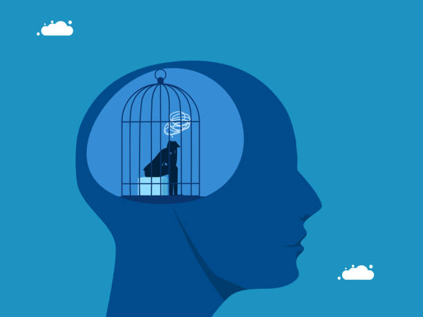 istock Depression. Businessman stuck in a cage on a human brain 2001605375