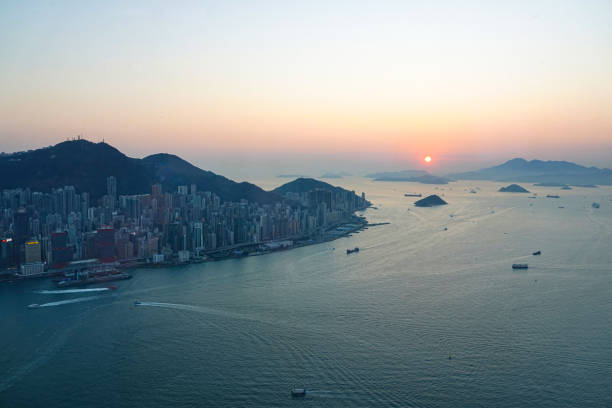 istock Hong Kong harbour at sunset 2001692194