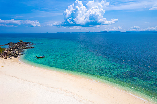 Aerial view of Island in the Andaman Sea. natural blue sea Tropical seas of Thailand The beautiful scenery of the island is very impressive.