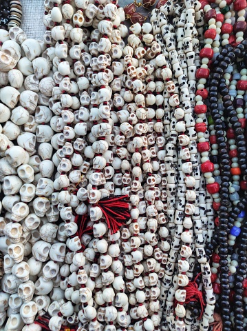 White skull necklace set made from plastic - looks like aghori sadhu