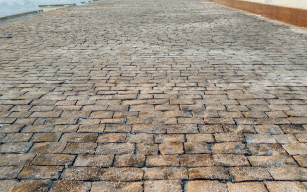 istock Stone texture of a city road in winter. 2001751114