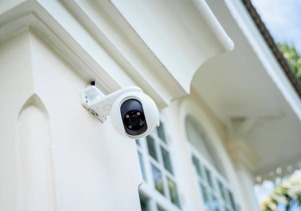 istock Modern CCTV camera on a wall of a residential building 2001755976