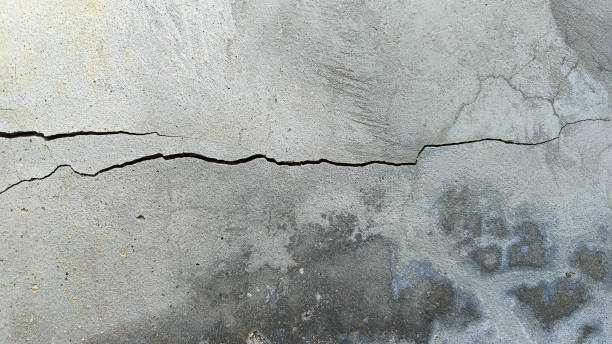 istock White and black distressed grunge concrete wall pattern for graphic design. 2001851917