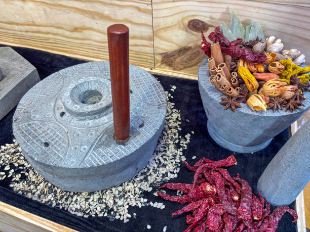 istock Various herbs and spices on black stone plate 2001867410