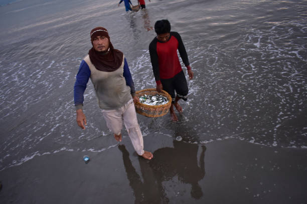 On Banda Aceh 12/09/2018. A group of Javanese village fishermen brought their caught fish to be collected and marketed. This activity, which takes place every day, attracts local people to buy fresh fish.