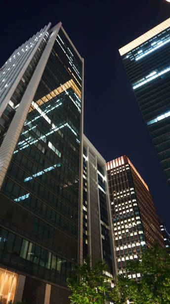 istock Skyscrapers in the office district at night 2001907753
