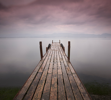 Pier in the Sea of ​​Marmara. This shot was taken on a wet and stormy day when the dock spaces were covered in rain and overcast clouds looked ominous.
