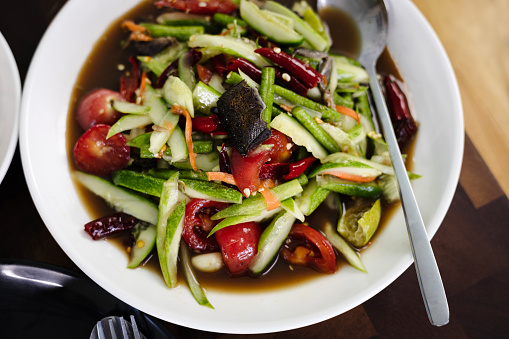 Close-up Of Spicy Cucumber Salad In Plate.