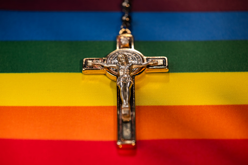 Crucifix on LGBT rainbow flag